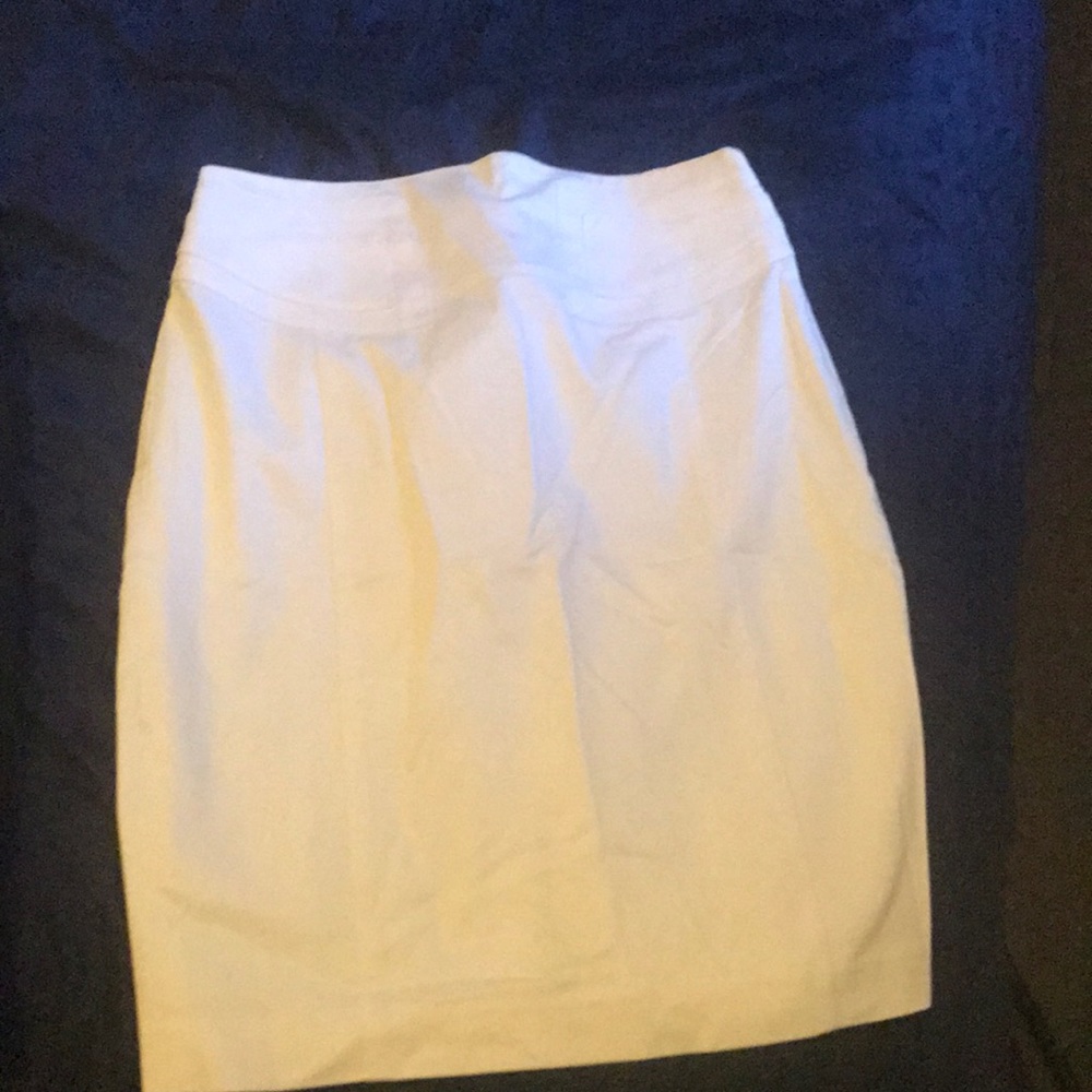 White skirt with buckle detail